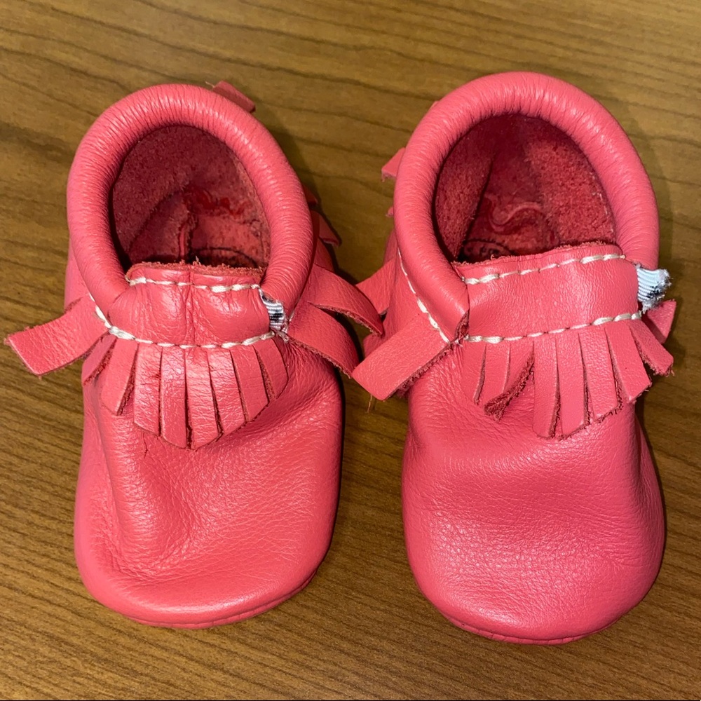Washed red fringe soft sole moccs